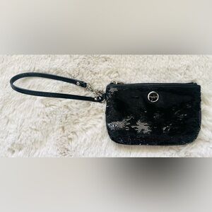 NWOT Coach Black Sequin Wristlet 
6.5 Wide x 4.25 Height